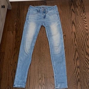 Light blue low-rise jeans.